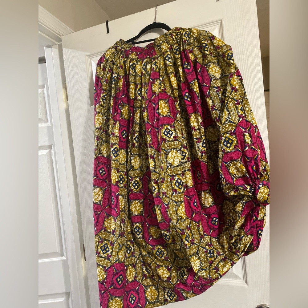 Gently used Handmade printed African attire inspired skirt. Fits sizes M-L.